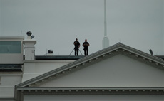 Guards Standing on Top of the White House